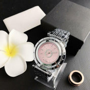 Relojes analógicos con corona con logotipo