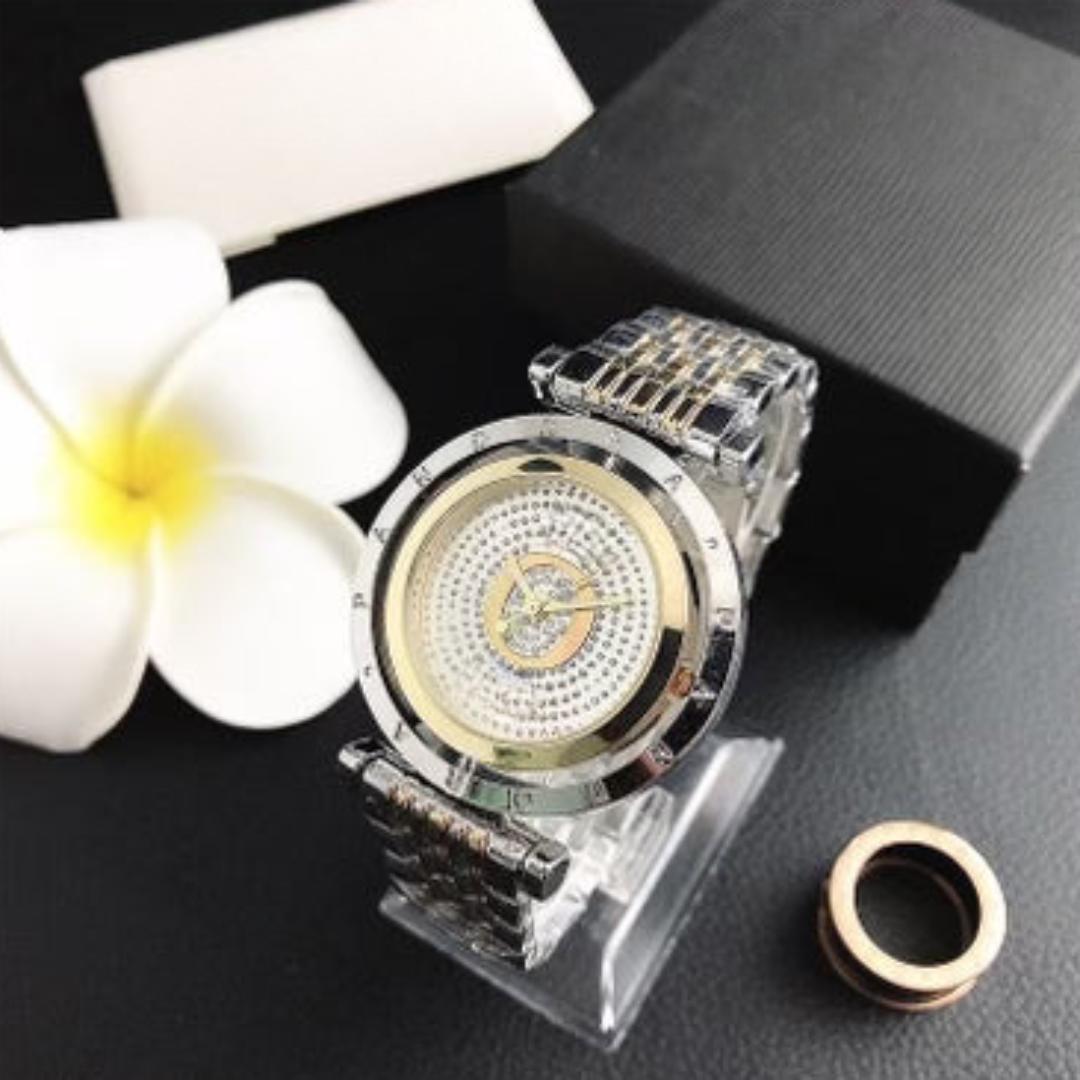 Relojes analógicos con corona con logotipo