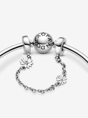 Dije de cadena de seguridad con margaritas