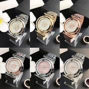 Relojes analógicos con corona con logotipo