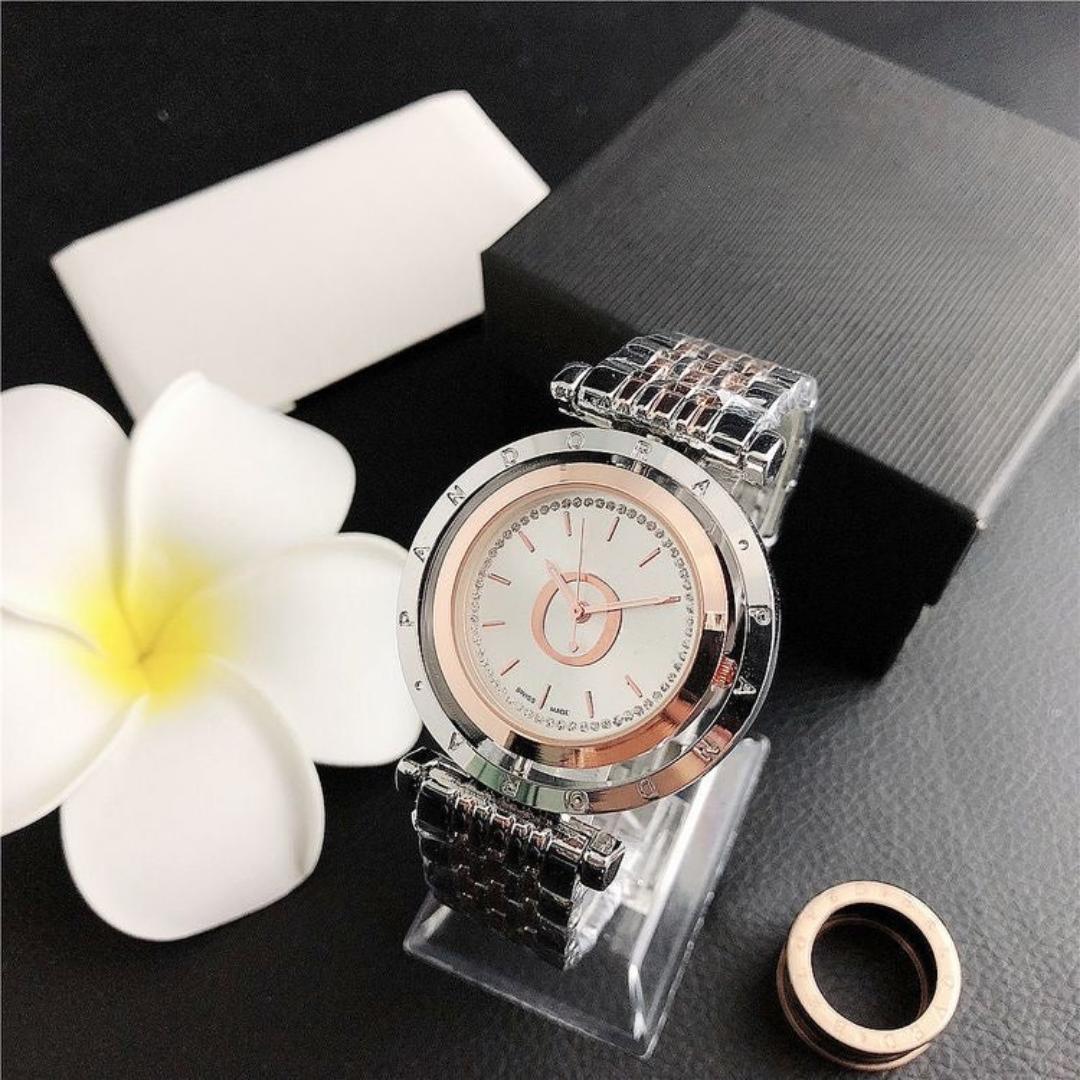 Relojes analógicos con corona con logotipo
