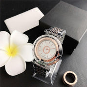Relojes analógicos con corona con logotipo